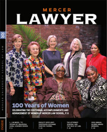 Magazine cover with a group of alumnae
