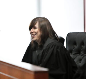 Katie Powers dressed in judge's robes