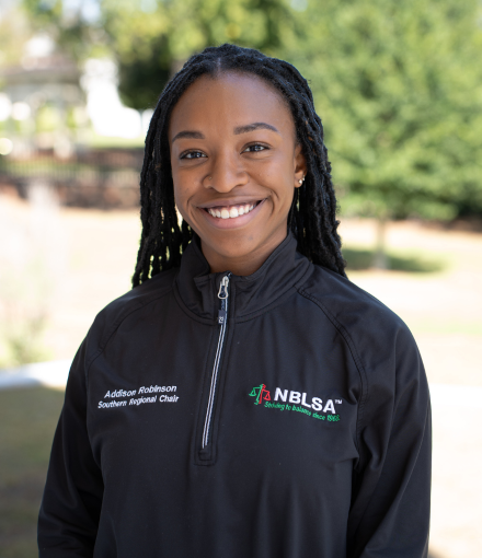 Headshot of Addison Robinson standing outside