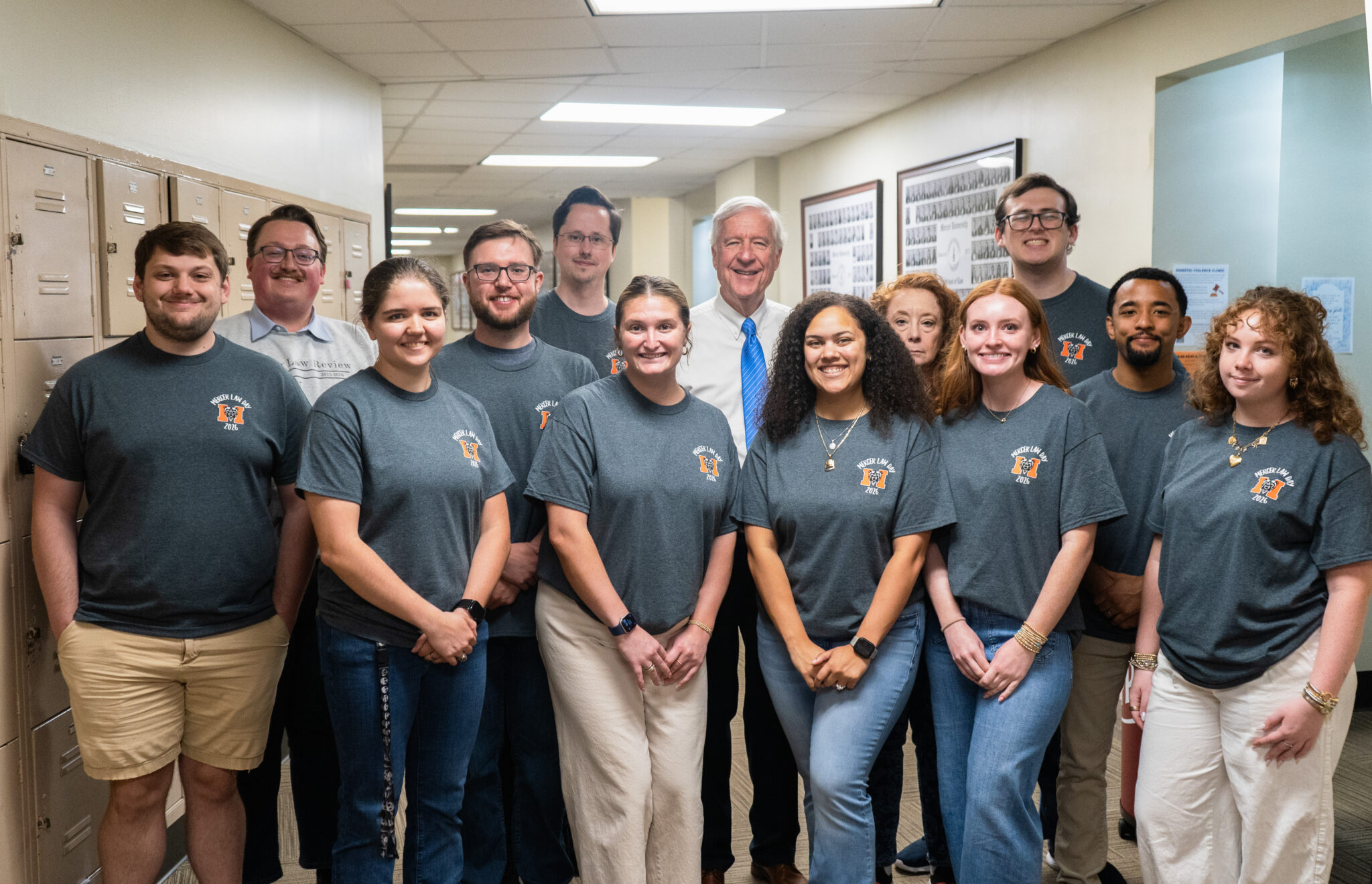 Mercer Law students stand in a hallway with Judge Story
