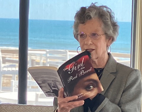 Susan Middleton holding her book