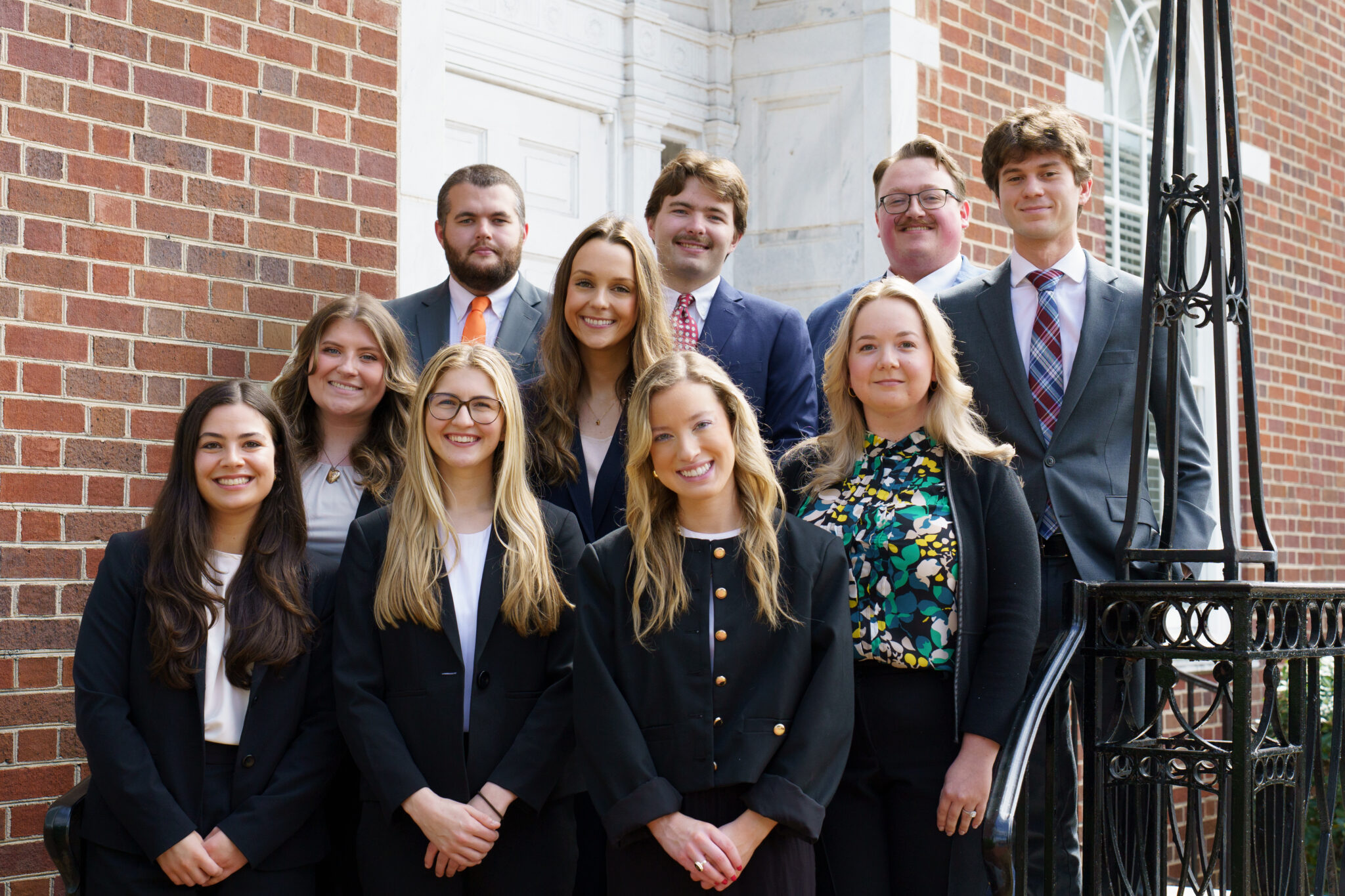 Law Review students stand on the steps of the law school